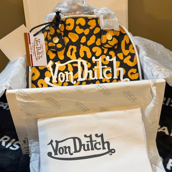 Von Dutch Handbags - NWT Von Dutch Orange and Black Animal Print Crossbody Bag